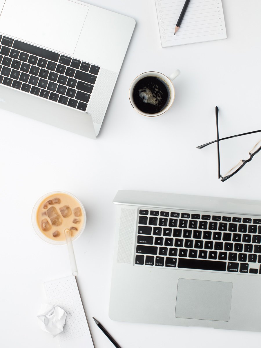 Workplace setting for an experienced bookkeeper managing financial transactions and records at a desk.