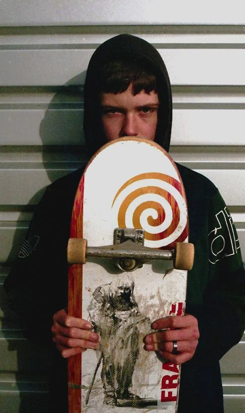 matty holding his board - Copy.jpg