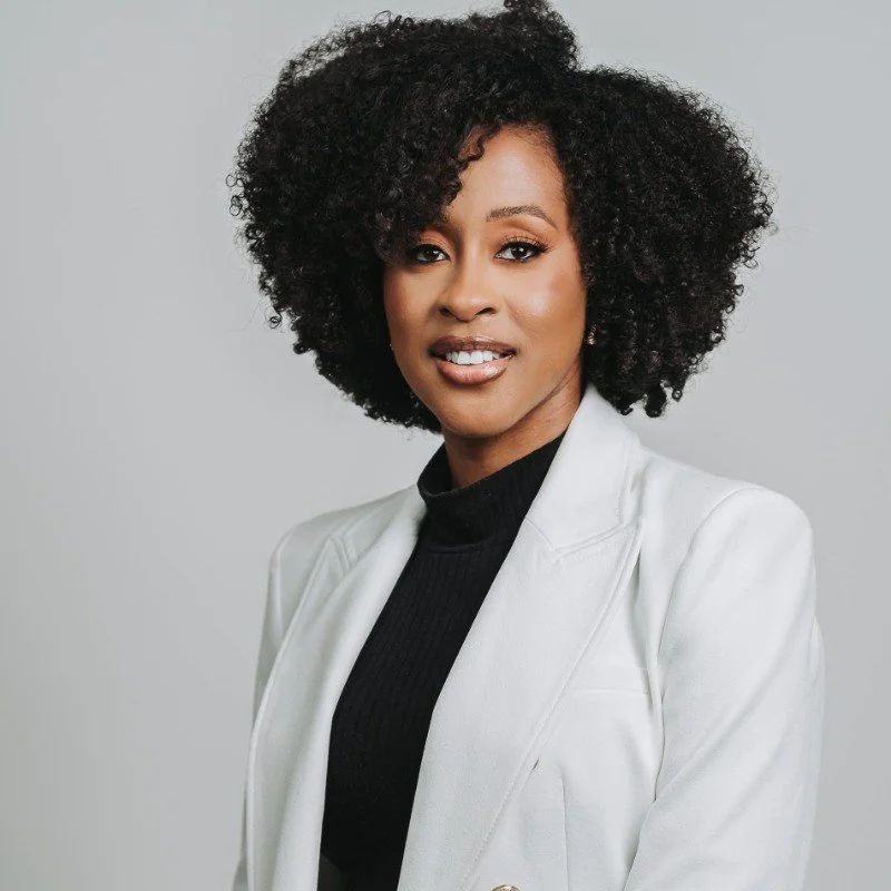 Headshot photo of a woman named Jennifer Amponsah Adjalo