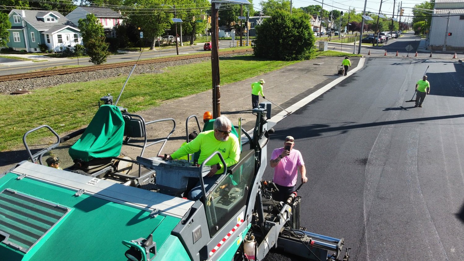Jem Paving crew installing fresh asphalt on a New Jersey roadway