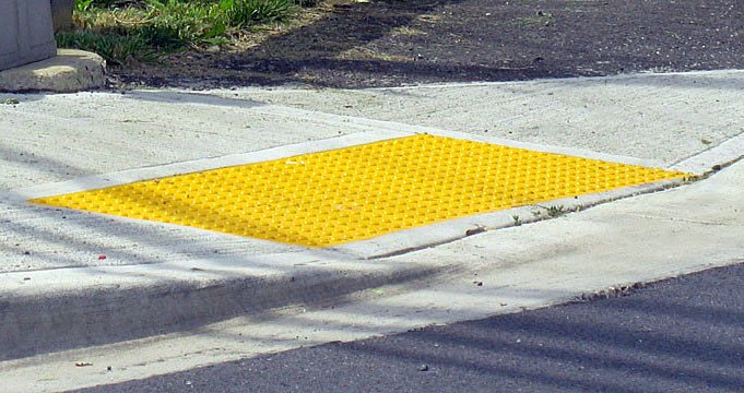 Truncated domes and ADA ramp example