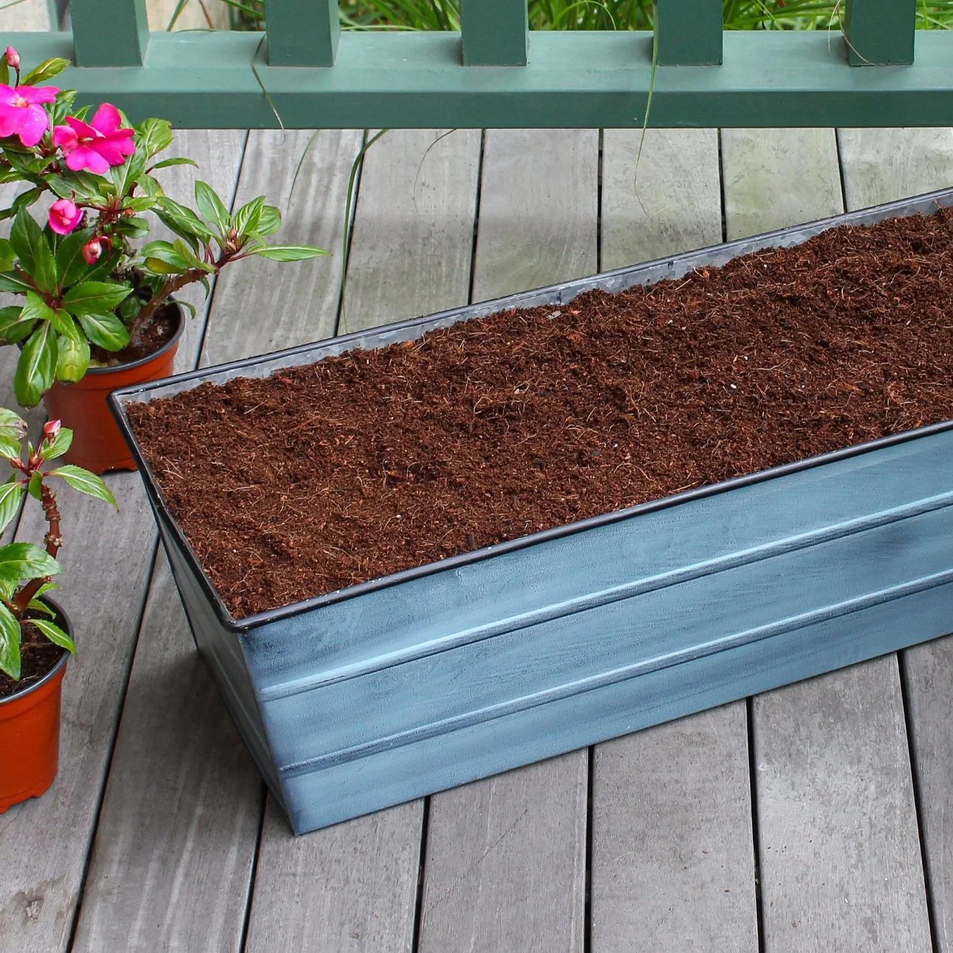 Hand molded bendy green candlestick with ceramic holder