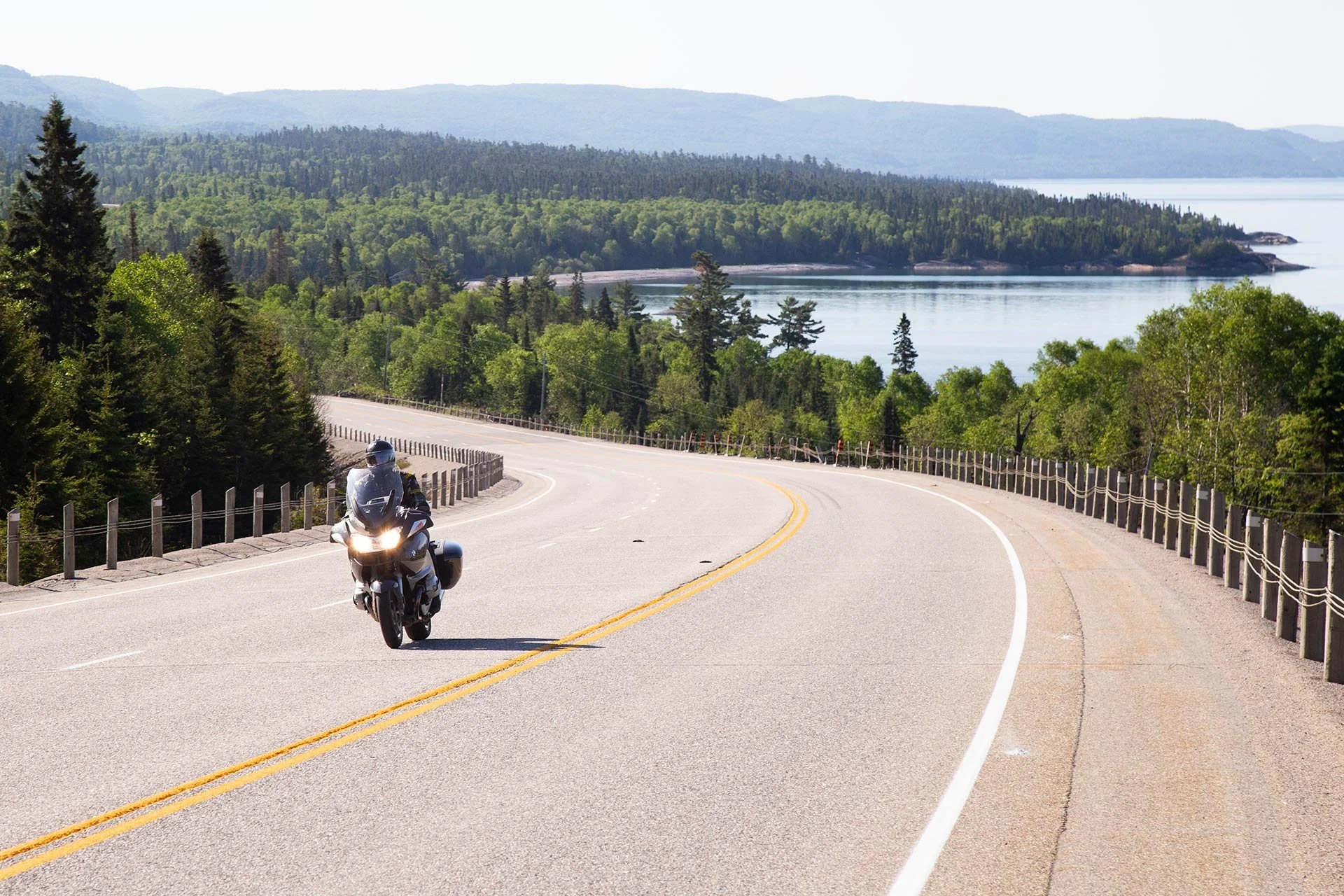 Motorcycle rider on Hyw 17 Lake Superior