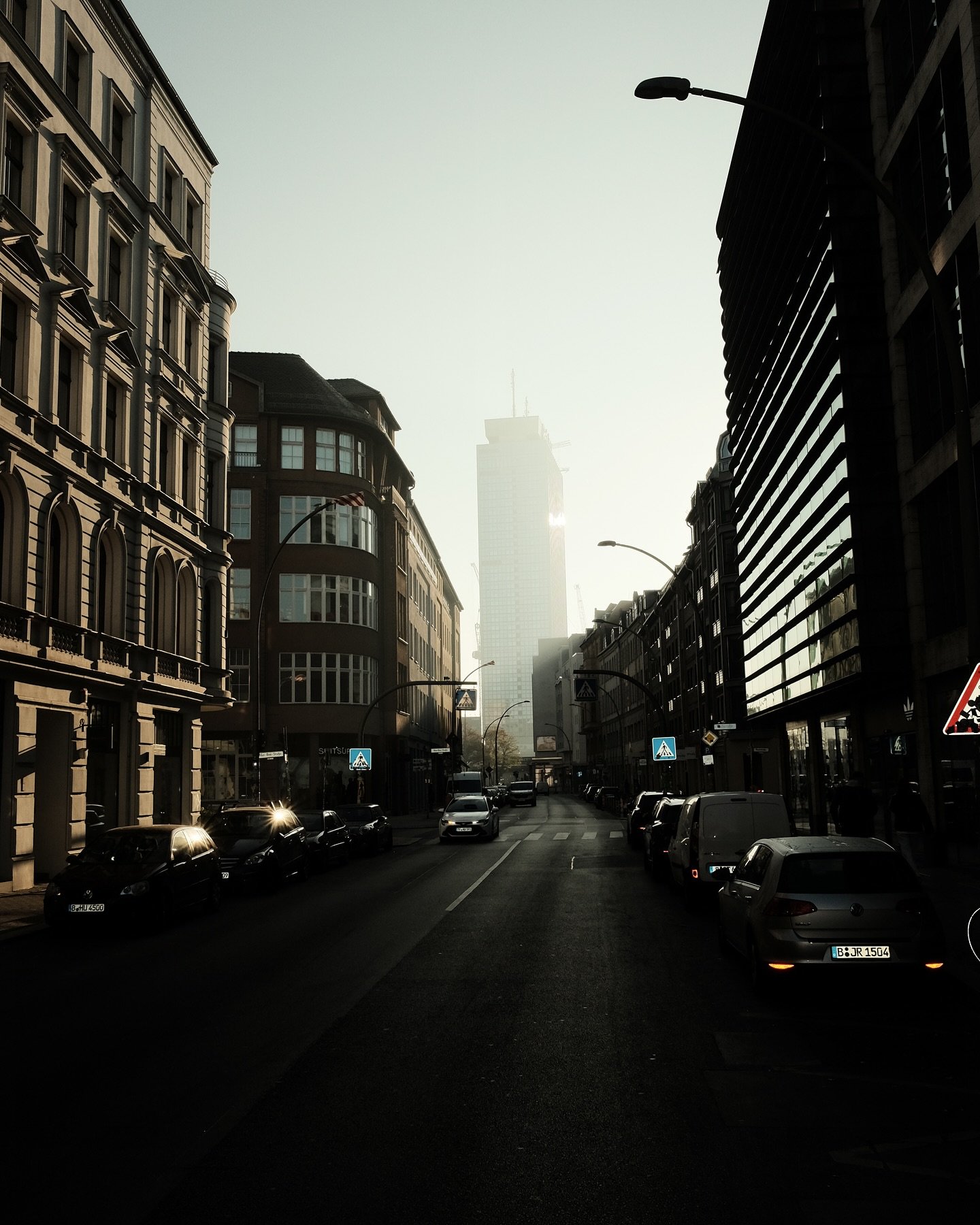 As the sun rises over Berlin, the city shares its secrets through beams of light. The warm glow turns my apartment into a magical place, making ordinary things special. My morning routine - the first taste of coffee, hugging my daughter, hearing dist