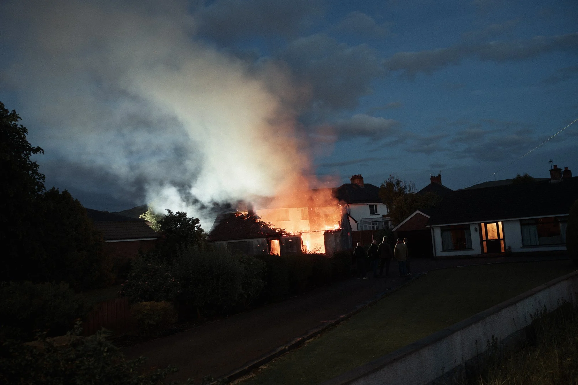 A house is torched during two nights of anti-immigrant riots in Belfast. 2026