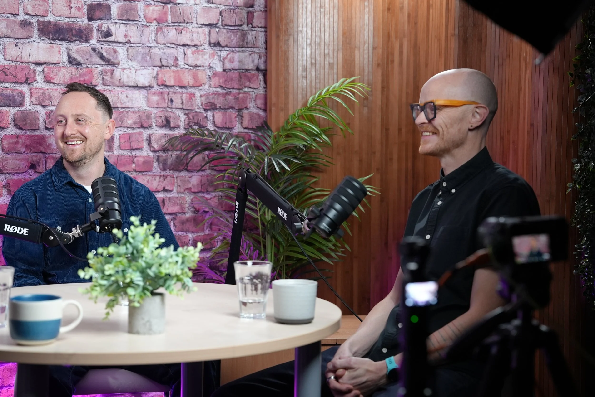 A behind the scenes photo taken of a podcast at the Watch & Learn Productions studio