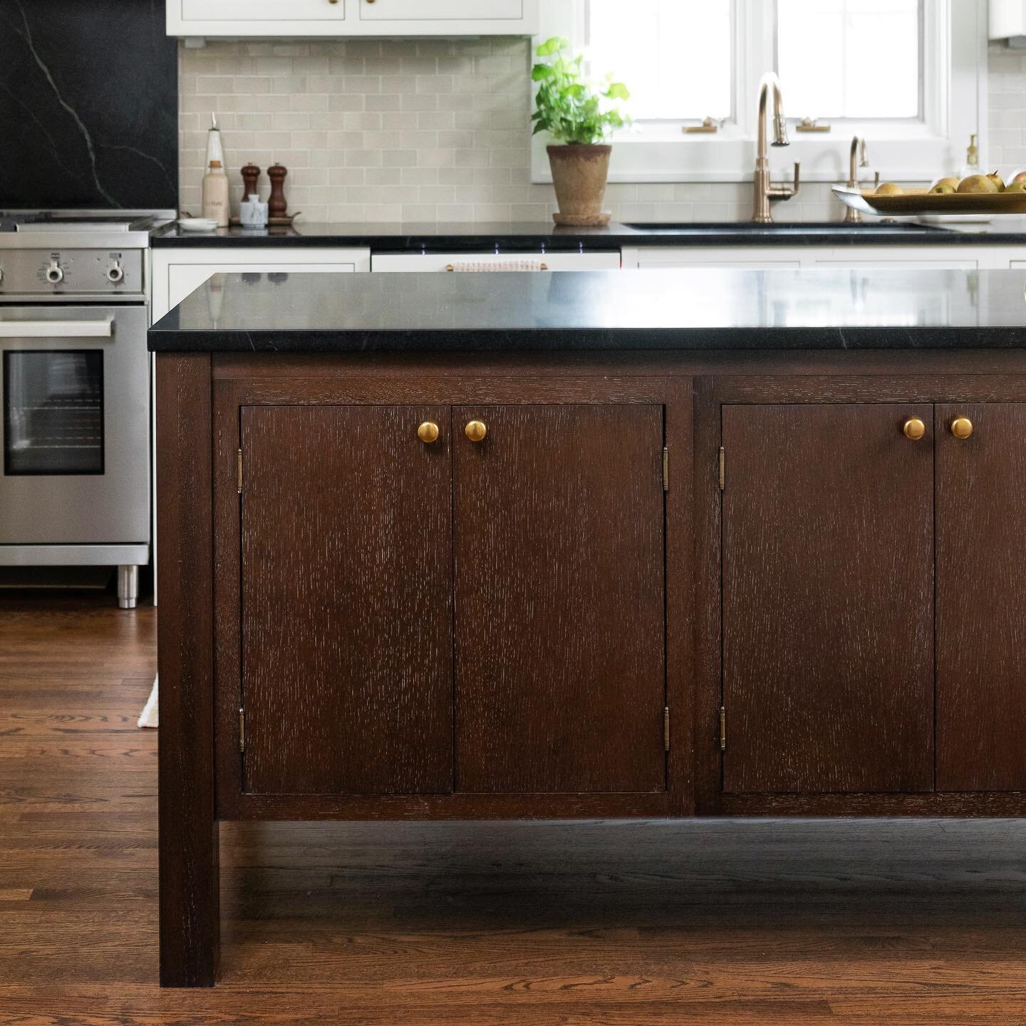 Furniture islands are one of my love languages :) This kitchen was an &ldquo;L&rdquo; with a very cramped small island and a wall separating it from the dining room. By making the island slim and long with seating at the end, we were able to fit this