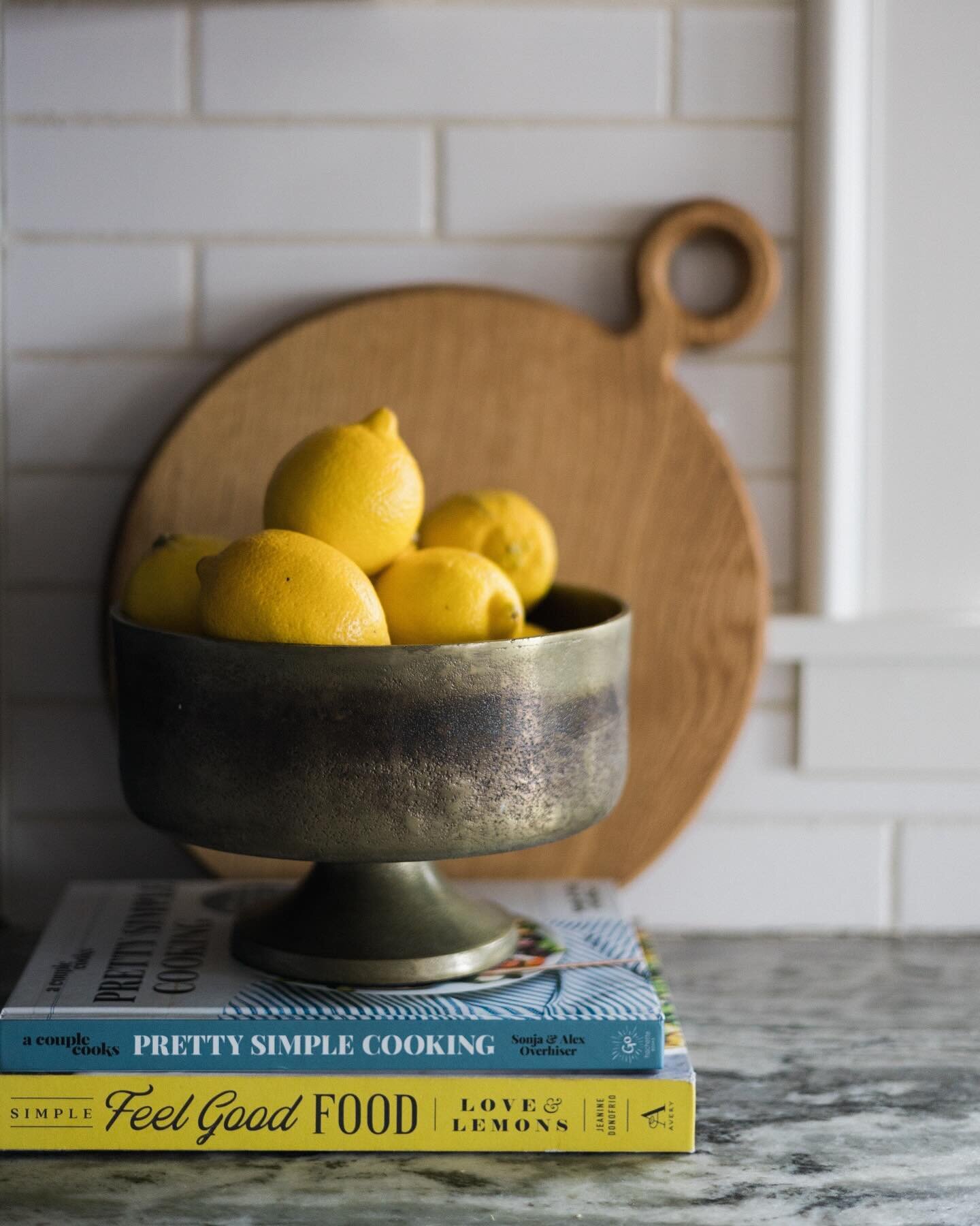 The secret to styling a kitchen- find pretty things to hold the utilitarian. That way you&rsquo;re not filling a space with &ldquo;stuff&rdquo;. Everything should be useful- a beautiful salt and pepper shaker, cutting board and oil carafe to start&he