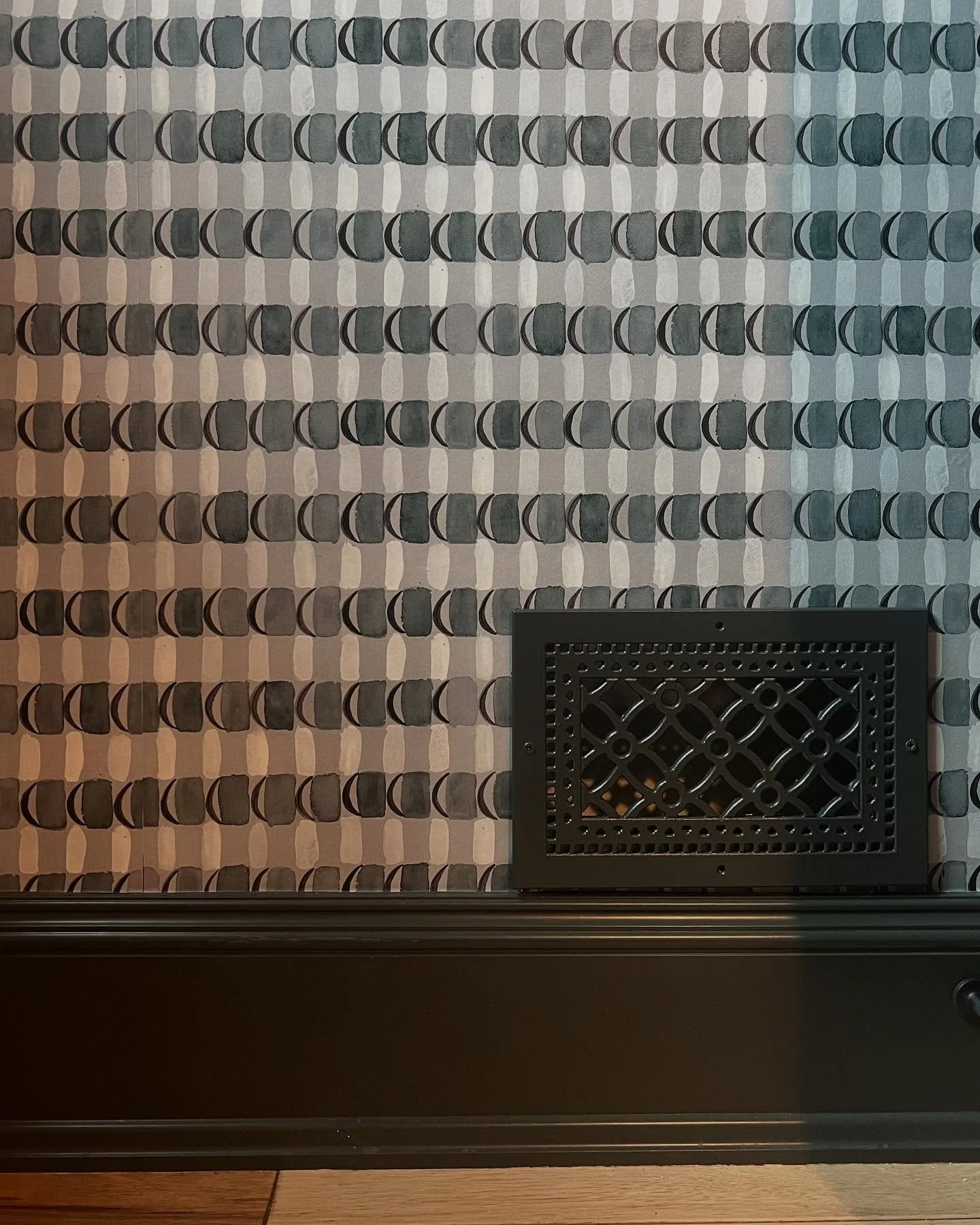 Loving this @rebeccaatwooddesigns wallpaper at our egr glow up! We chose a complimentary paint color for the trim and vent cover to really make it moody in there.