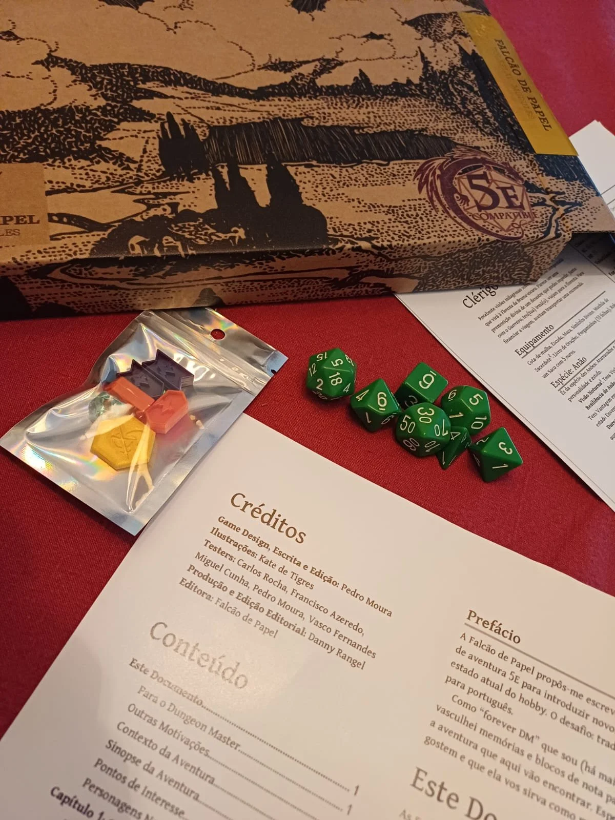 A box containing a campaign book, rules glossary, and pregenerated characters.