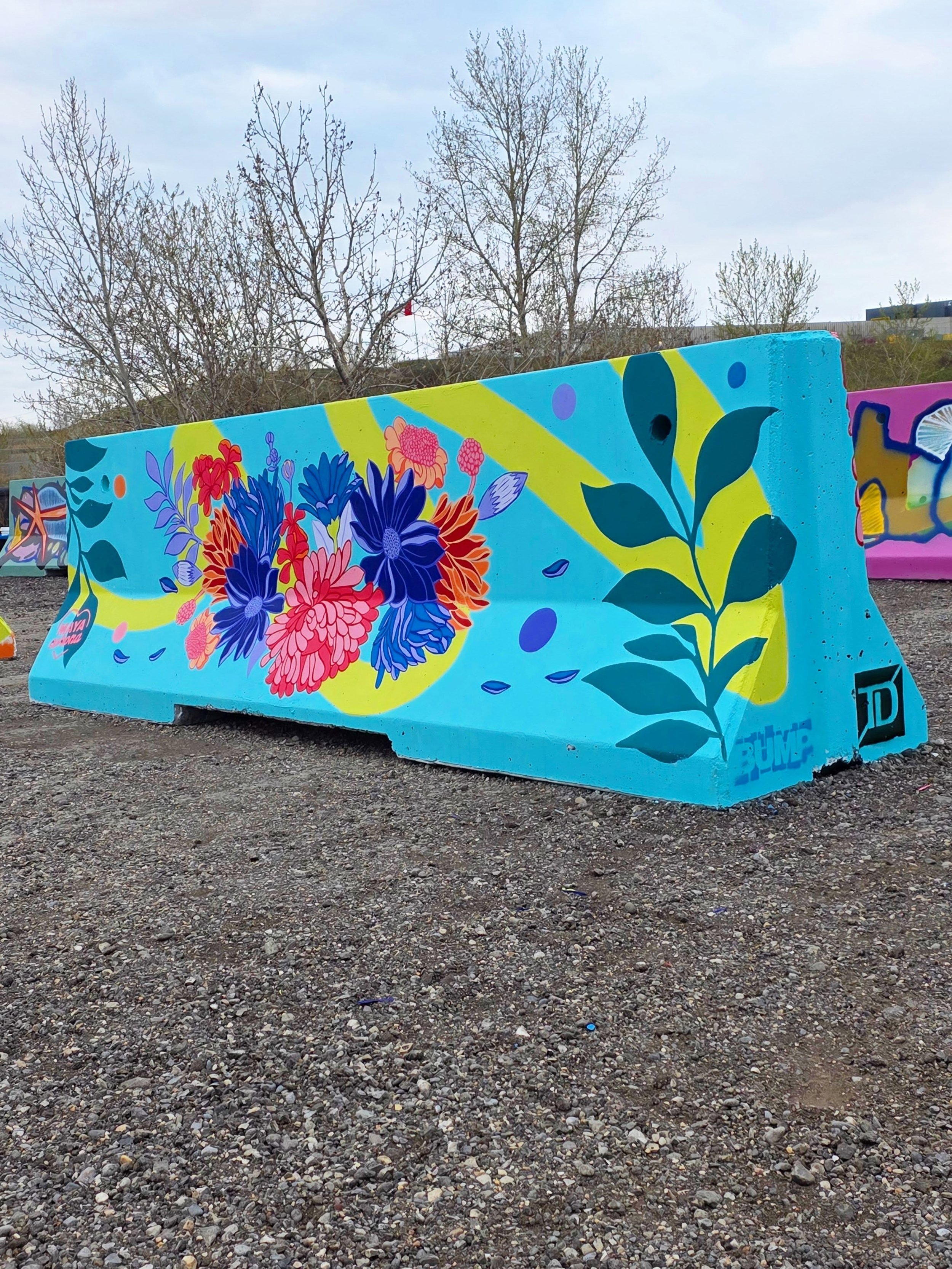 Concrete in full bloom! 🌸🌼🌱

Here is a closer look at the second jersey barrier I painted for the @yycbump #RoadWorks2026 program! I wanted to bring the organic beauty of nature right onto the asphalt. I designed a lush, vibrant floral arrangement
