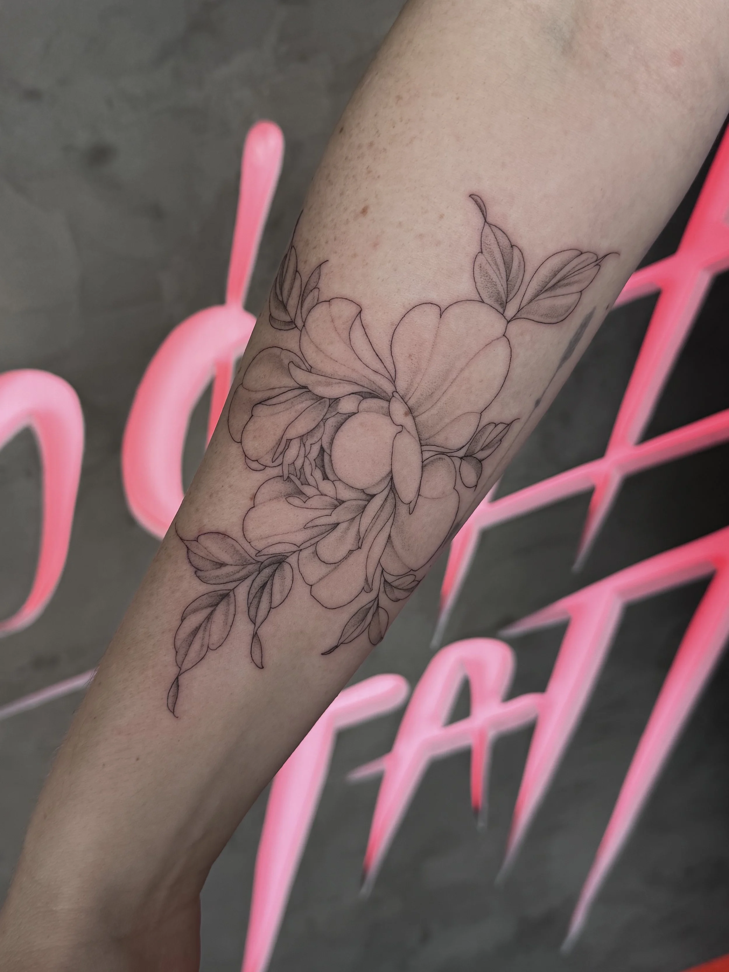 fine line floral tattoo