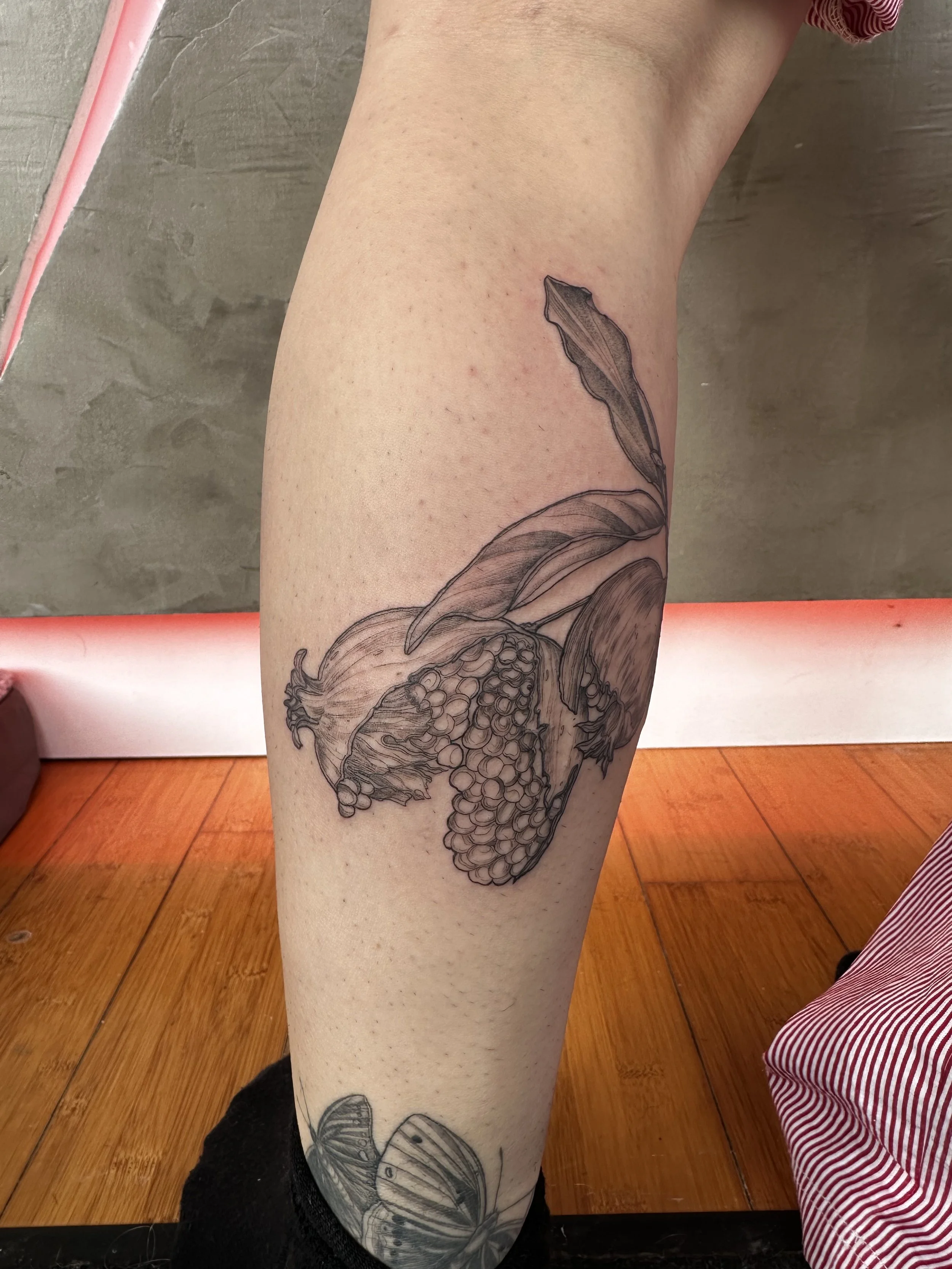 fine line tattoo pomegranate