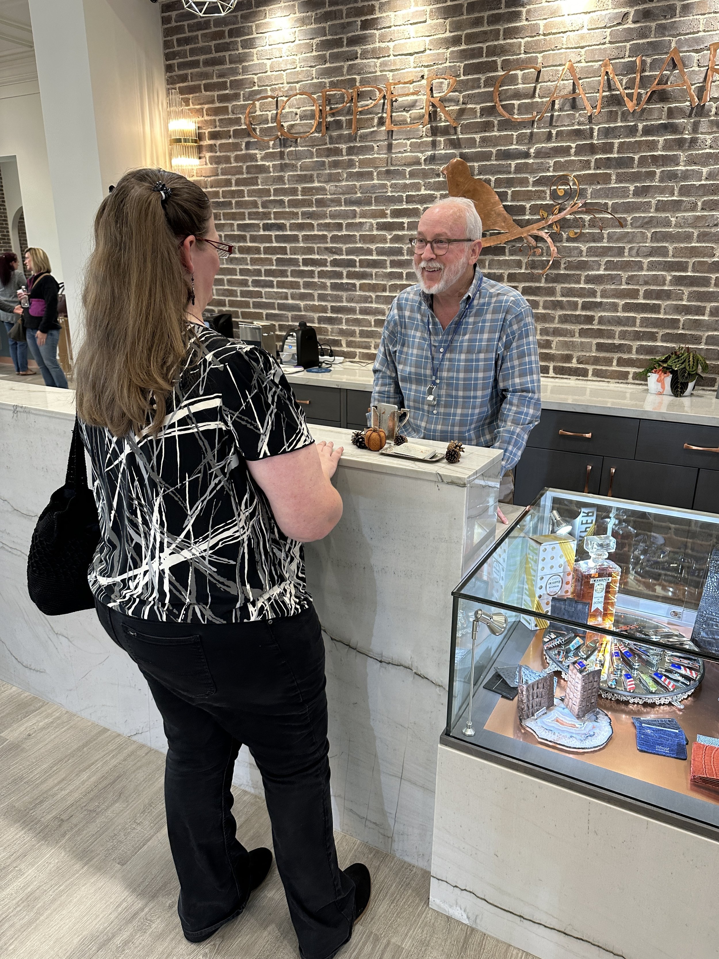 Perry at Copper Canary helping a customer