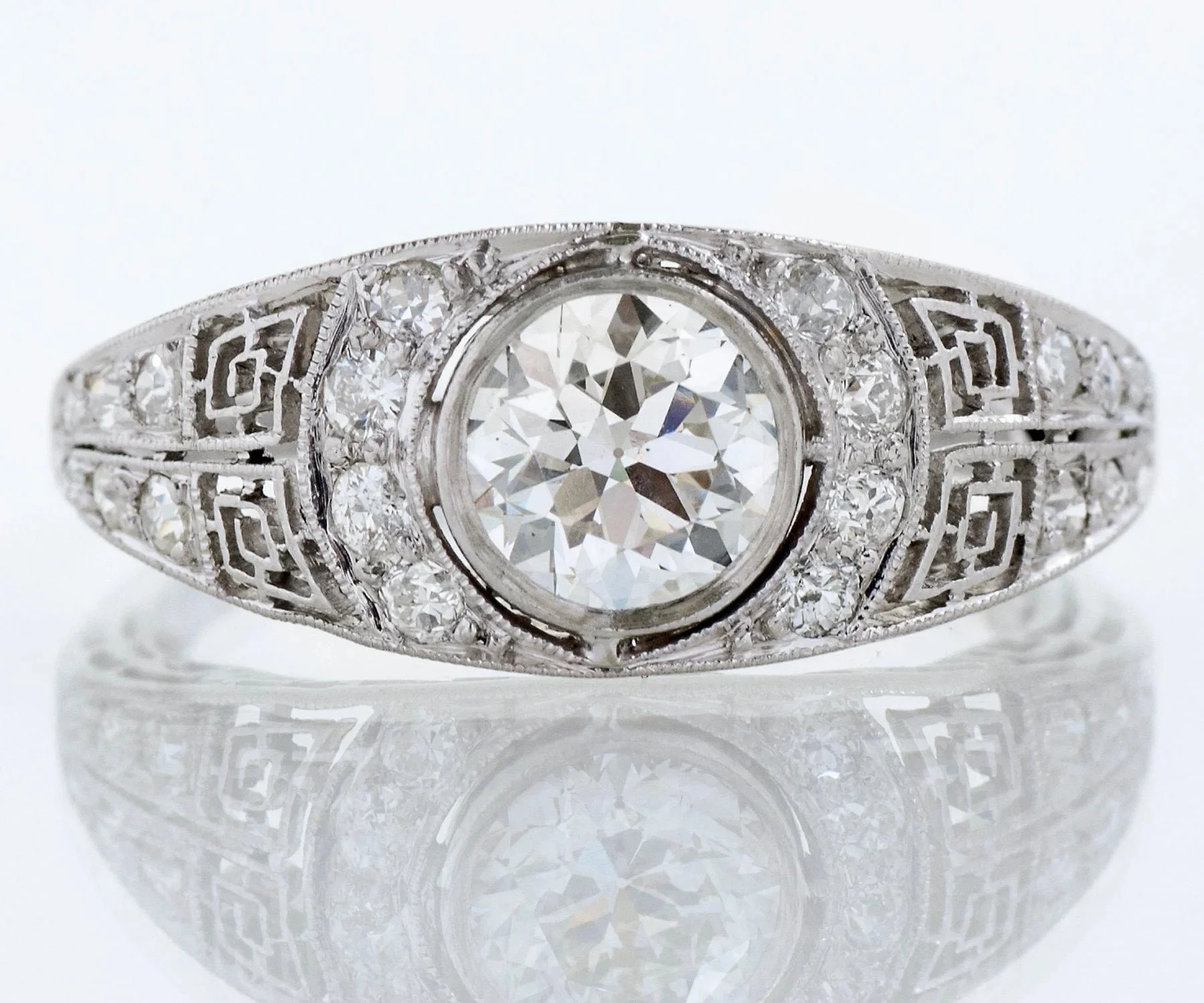 Antique Art Deco engagement ring in 18k white gold filigree with an old European cut diamond, from Copper Canary in Meridian