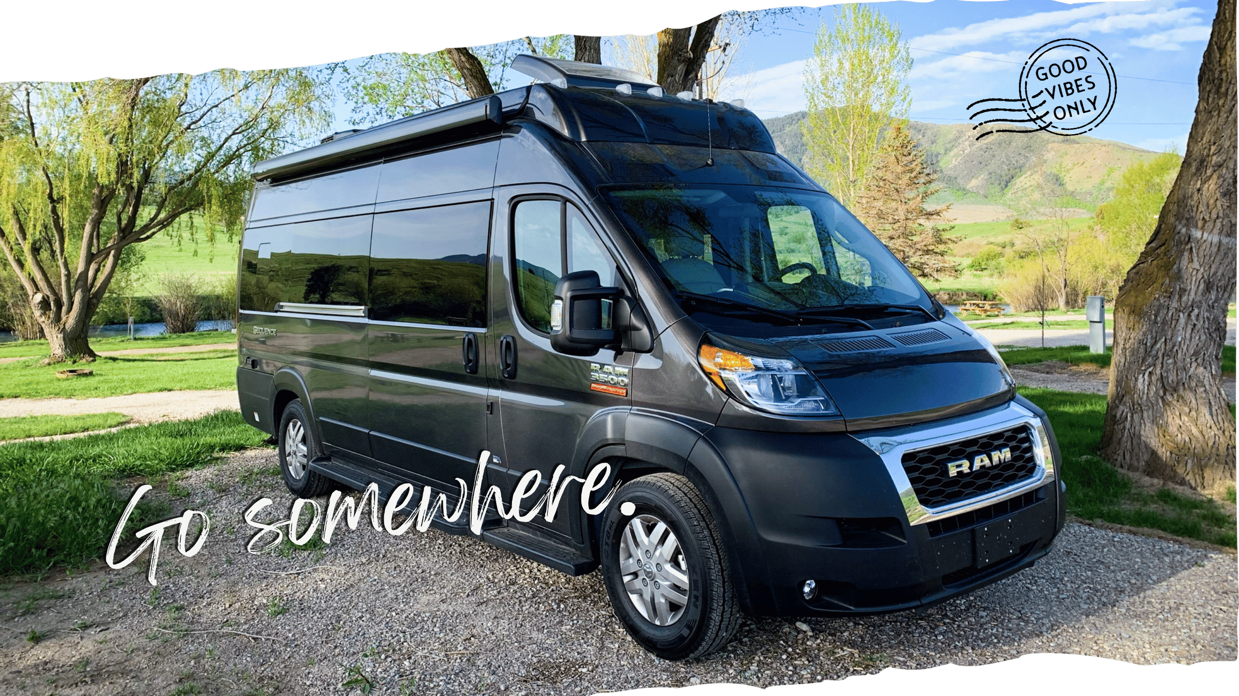 A camper van parked at a campsite surrounded by mountains in southeast Idaho.
