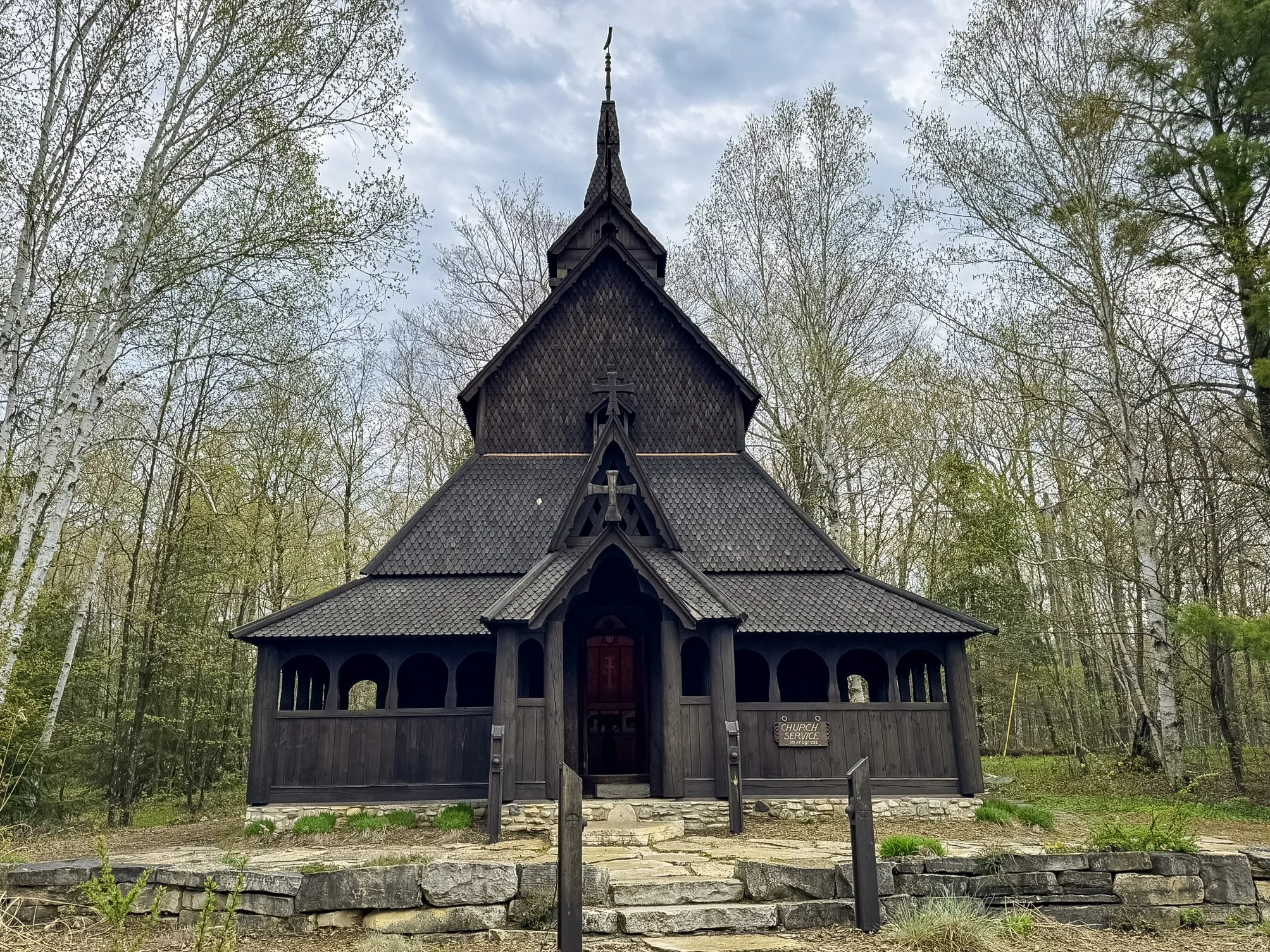 Washington Island Stavkirke, a wooden replica of Norway’s medieval Borgund Stave Church, stands among trees on Washington Island, Wisconsin.
