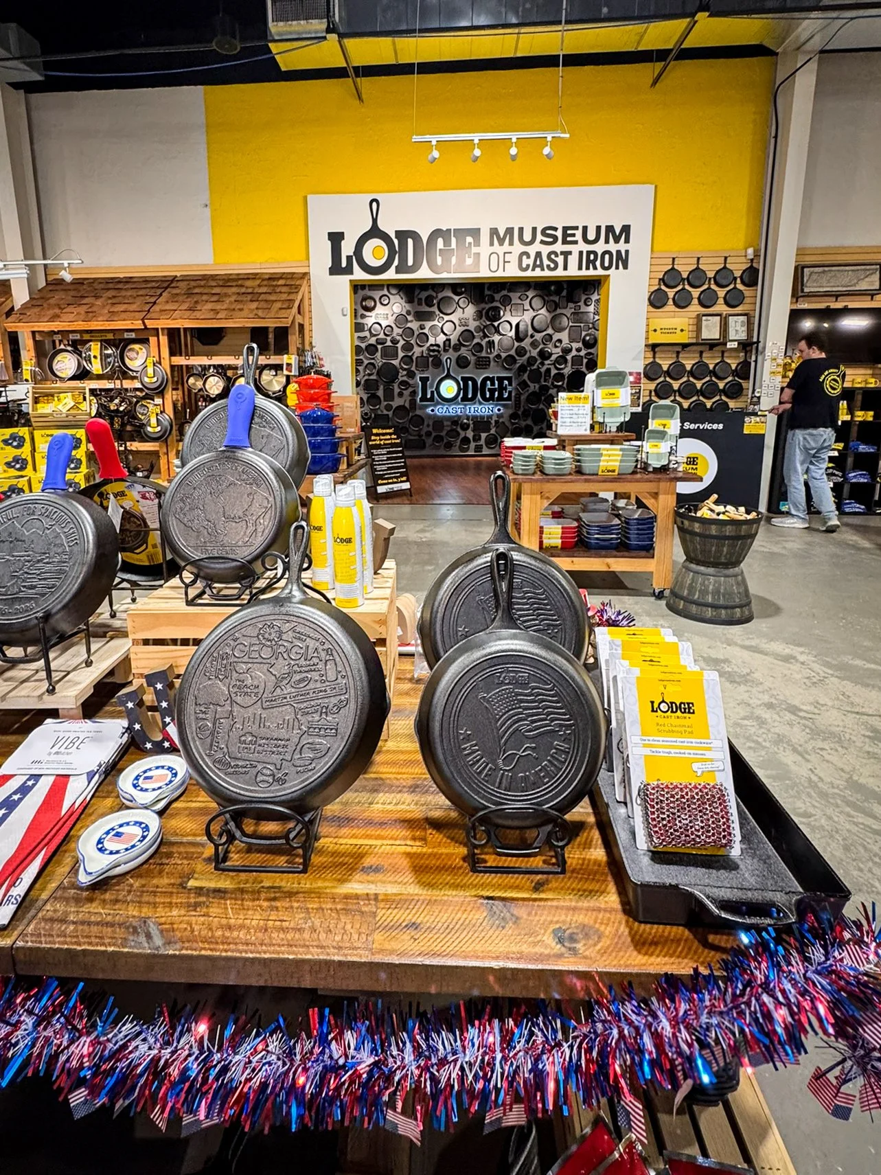 A display of cast iron skillets and cookware inside the entrance to the Lodge Museum of Cast Iron and store in South Pittsburg, Tennessee.