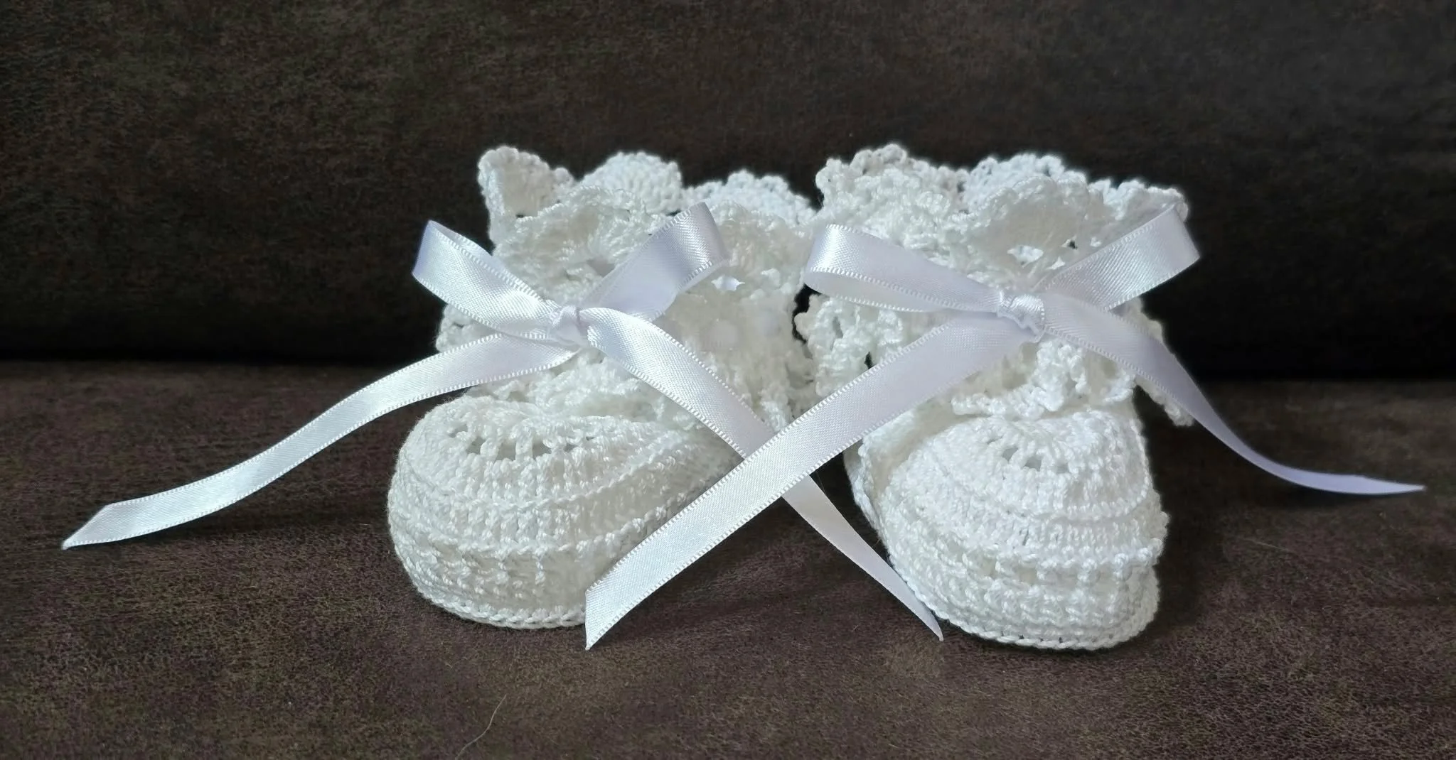 Baby Booties by Sandy Cisler