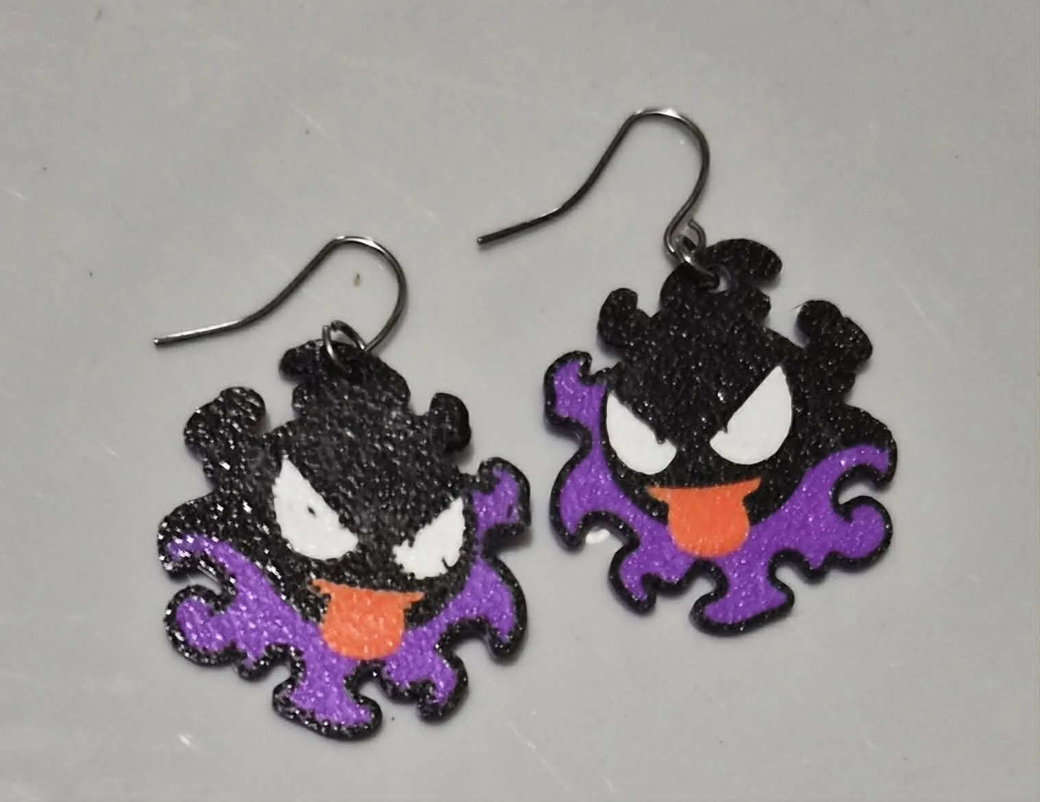 Earrings by Howard