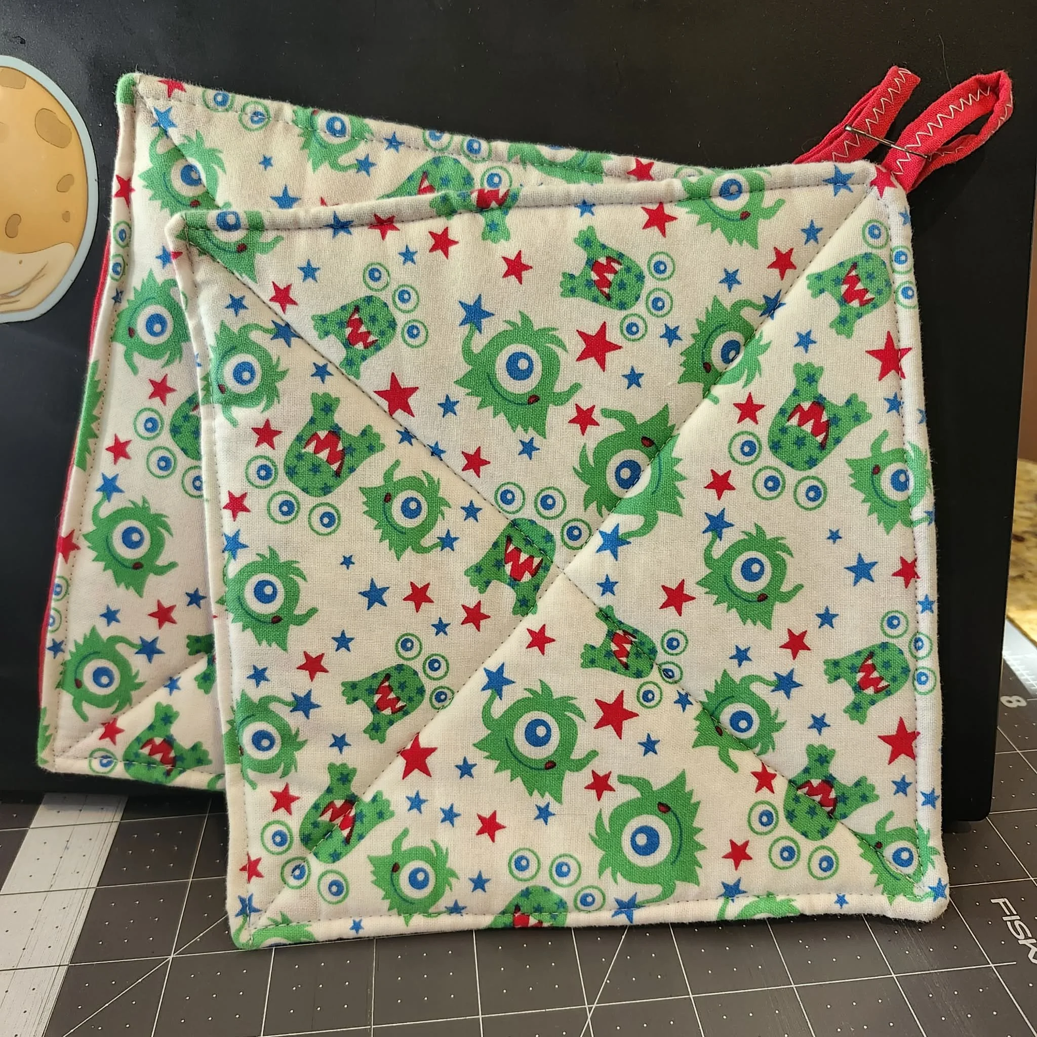 Monster Pot Holders by Aundrea