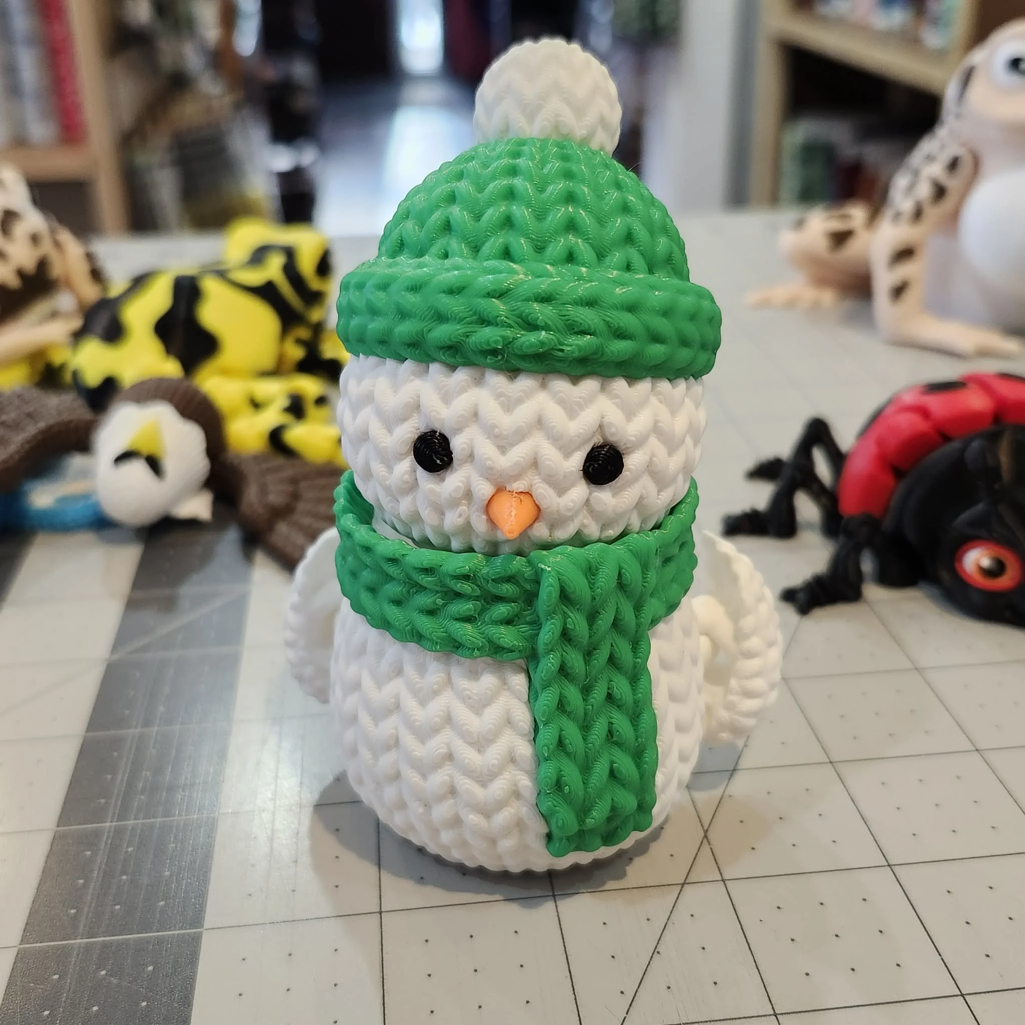 Snowman with Green Scarf, by Holly Ripley
