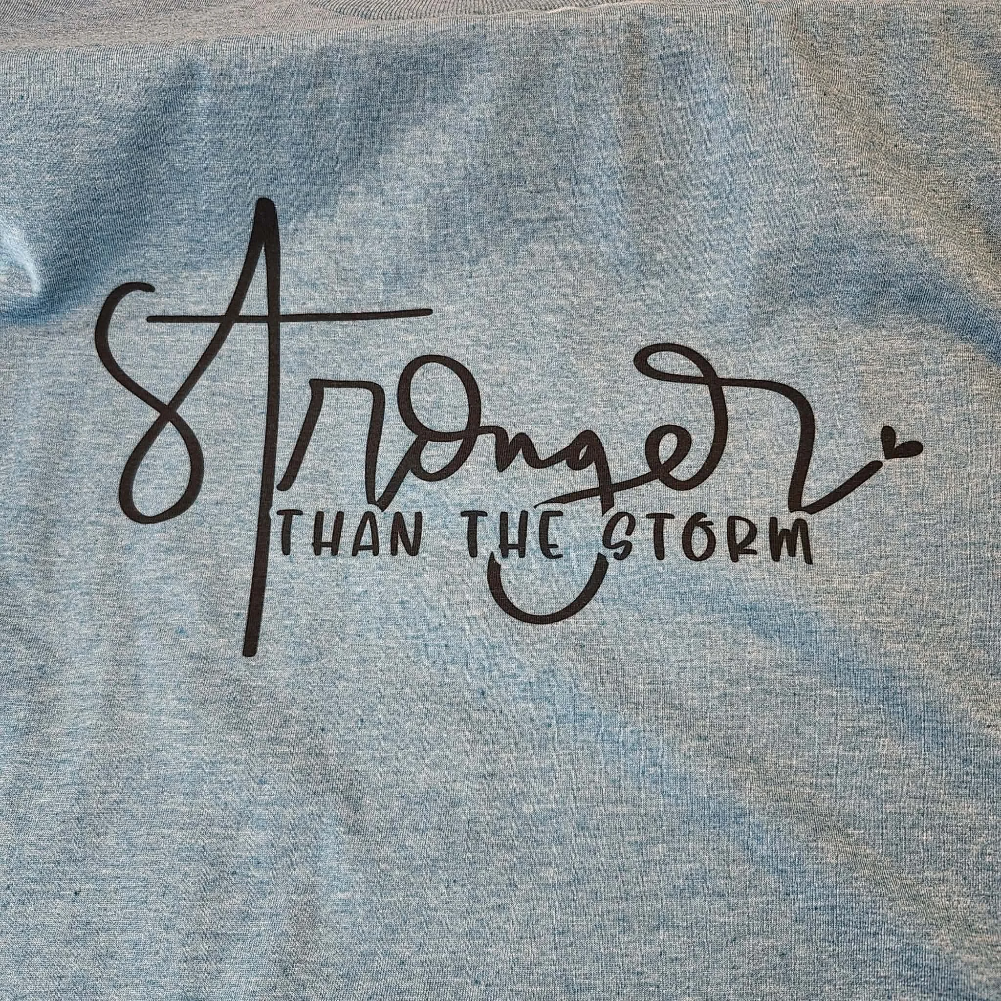 Stronger Than The Storm T-Shirt by D. Dawes