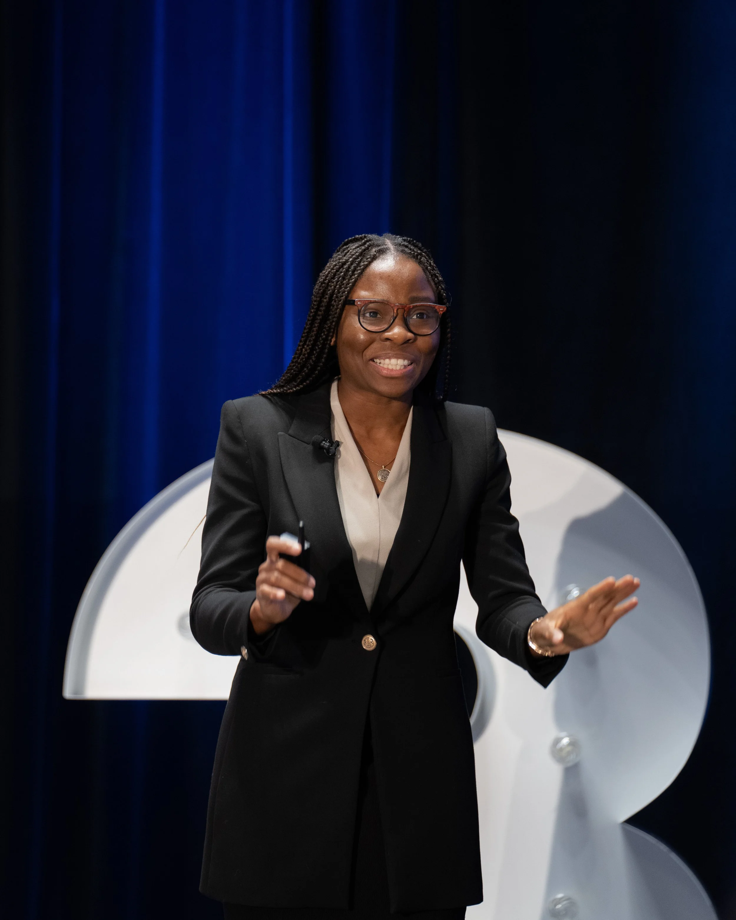 Precious Ile speaking at a PMI West Coast Chapter Annual Conference