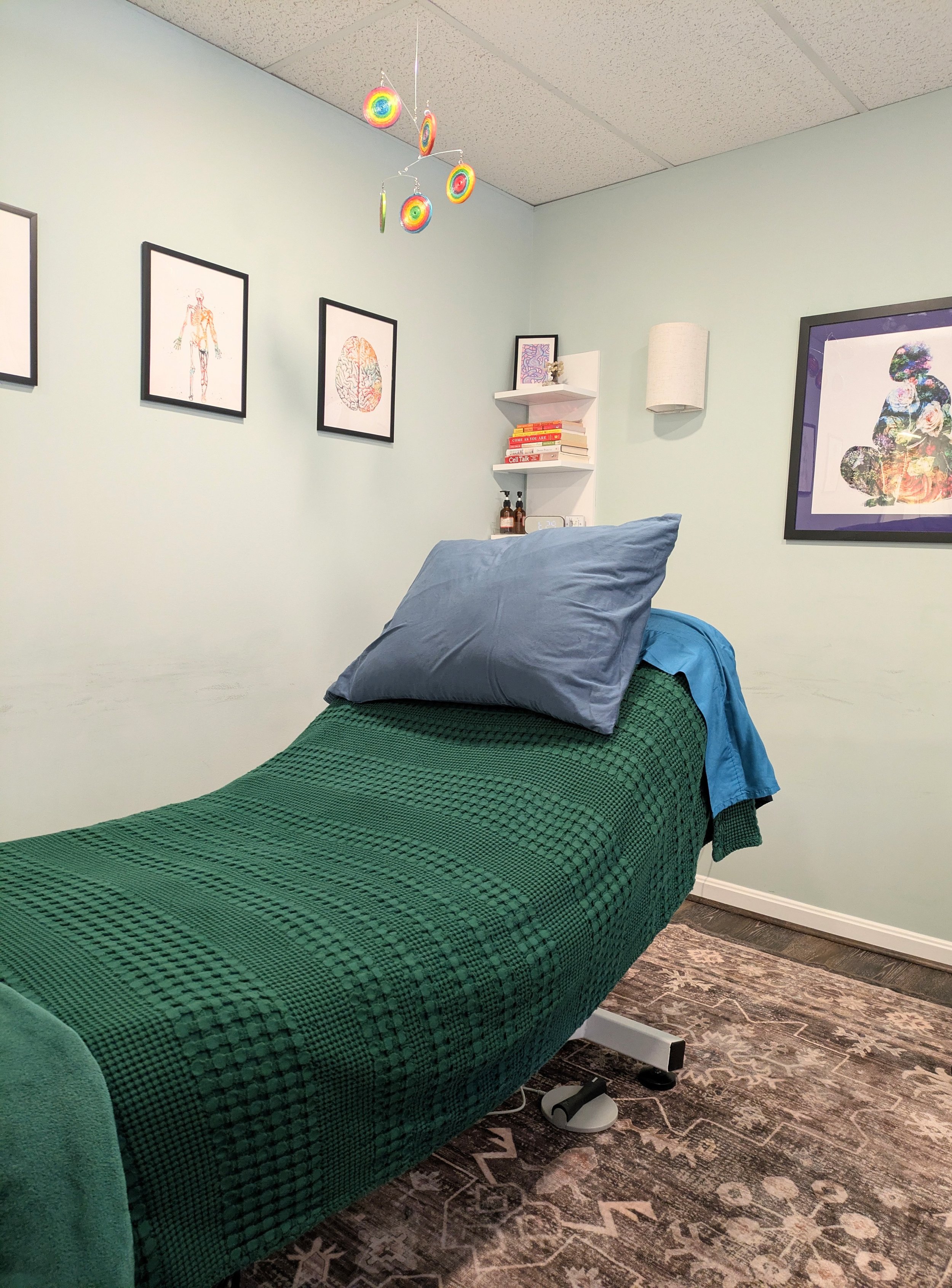 The head of the treatment table can elevate for your comfort
