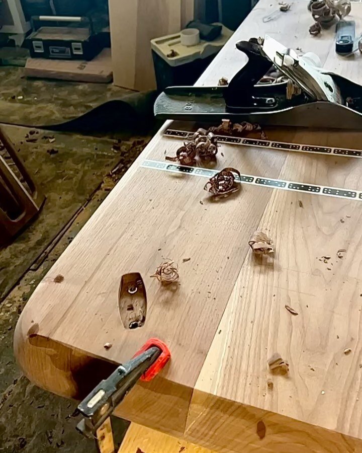 Some slow mo hand plane shots of  me increasing the bevel on the underside of this table top.