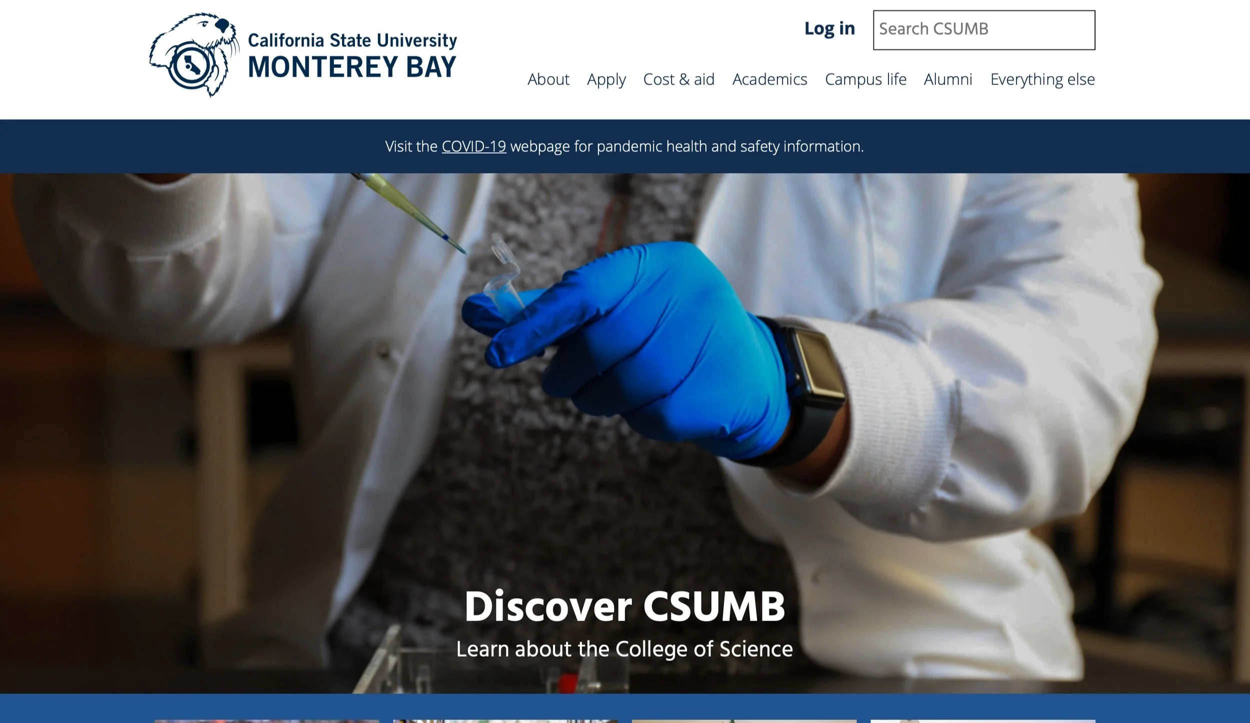 A person wearing a white lab coat, blue gloves, and a smartwatch is holding a pipette and a small container, likely working in a laboratory setting.