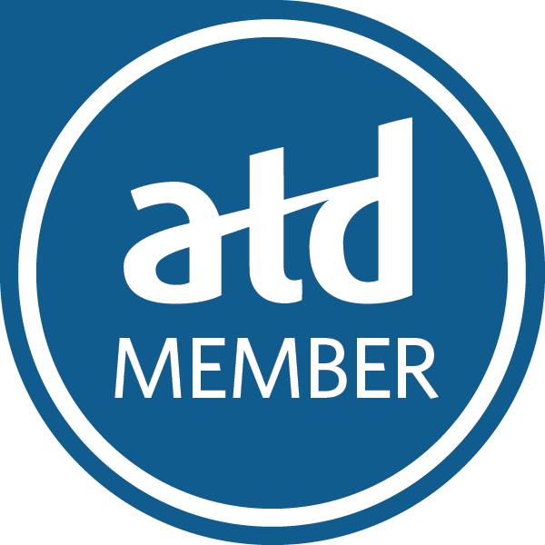 A circular badge with a blue background and black border, featuring the text "atd MEMBER" in white, with "atd" in lowercase and larger font, and "MEMBER" below in smaller font.