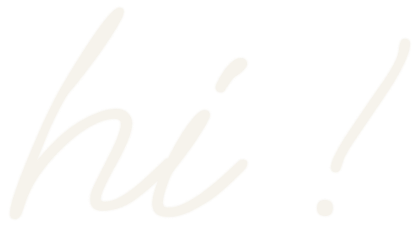 A close-up of a white object with the word "Hey!" written in large script, with yellow lines in the background.