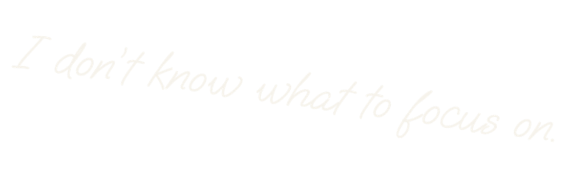 A quote written in white cursive font on a black background that says, "I don't know what to focus on."