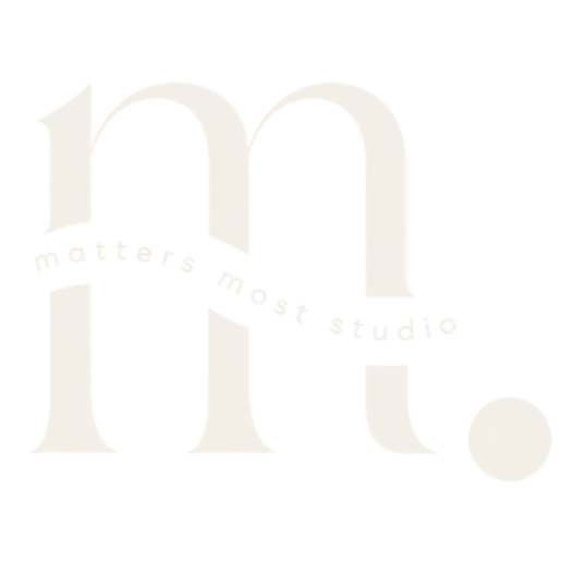 Logo White lowercase letter 'm' with a dotted line extending from and wrapping around it, ending in a dot.