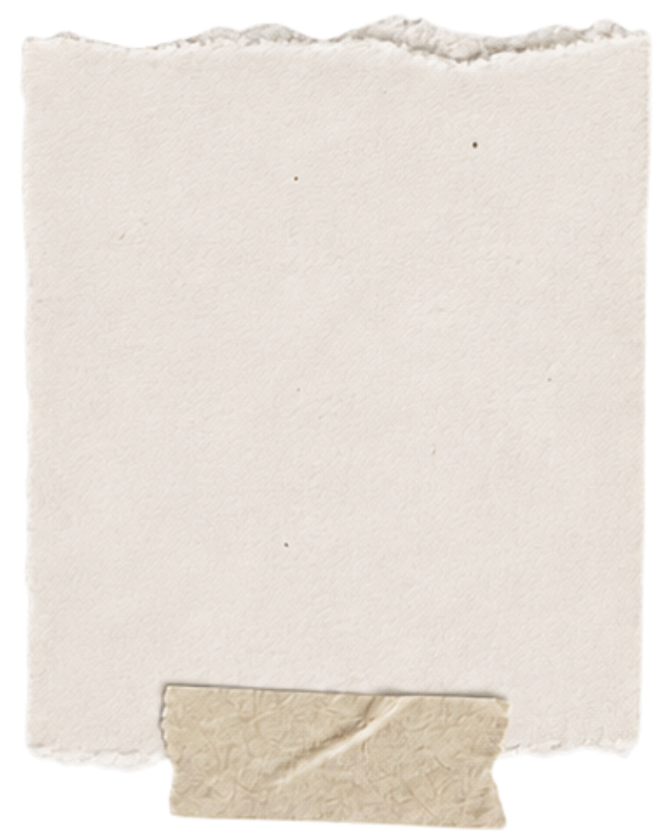 Close-up of a torn, blank sheet of paper with a small piece of tape at the bottom.