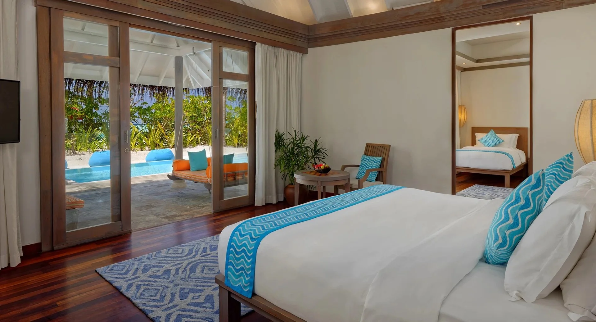 anantara_dhigu_two_bedroom_family_pool_villa_master_bedroom_1920x1037.jpg