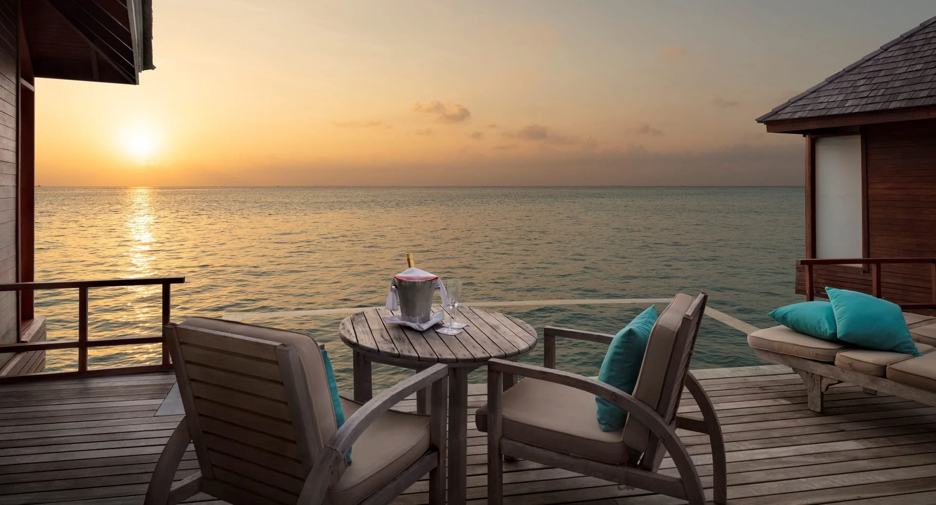 anantara_dhigu_sunset_over_water_pool_suite1920x1037.jpg