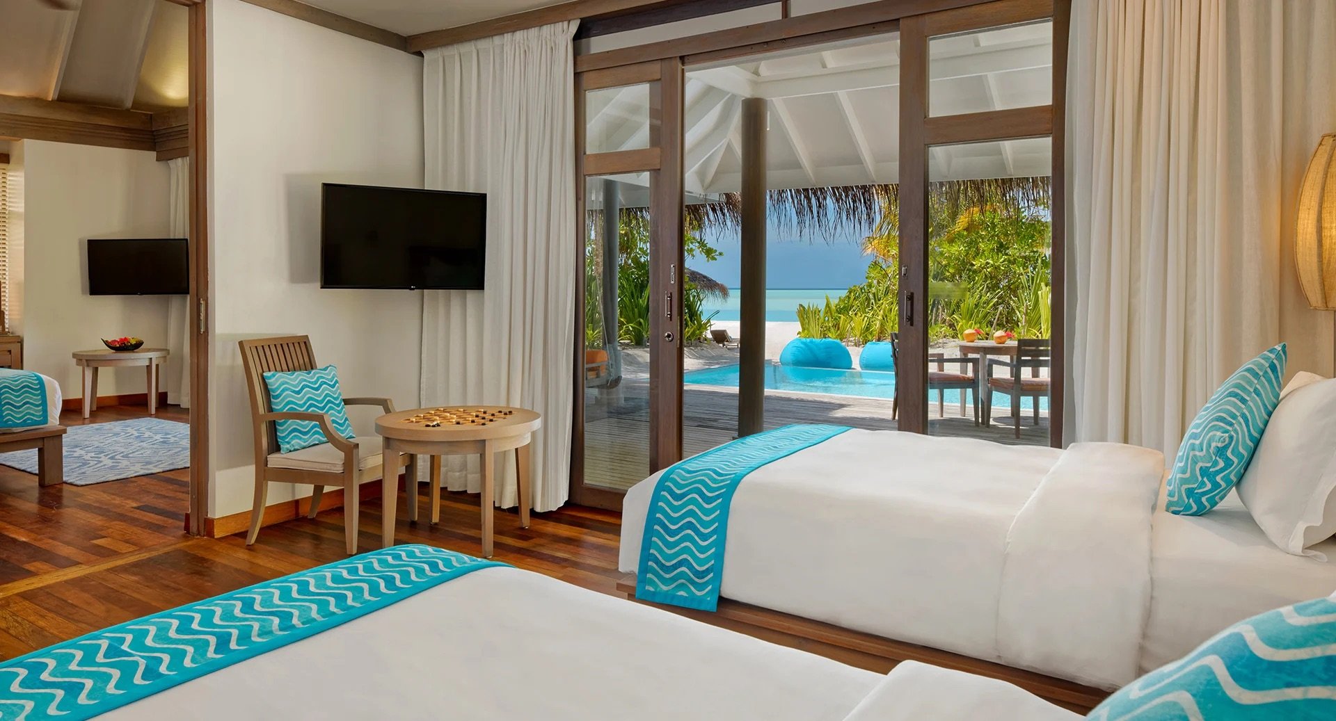 anantara_dhigu_bedroom_family_beach_pool_villa_1920x1037.jpg