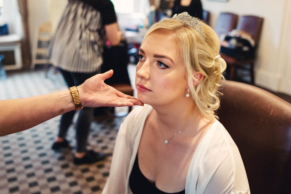 Bride getting made up at Warbrook House