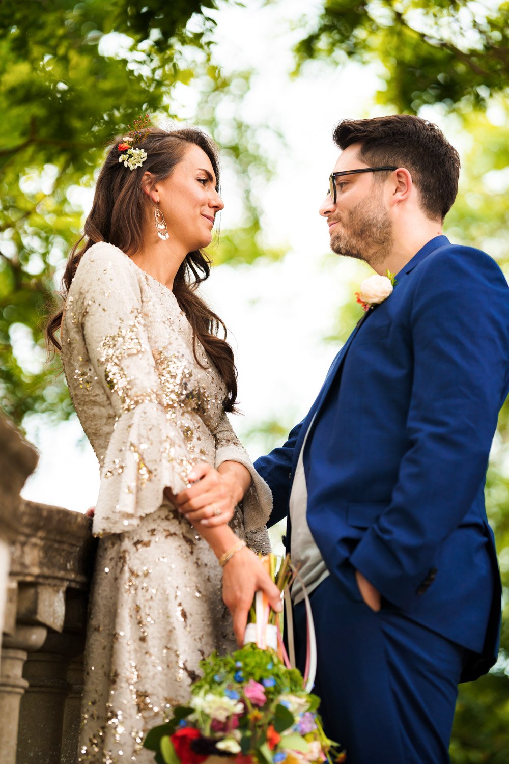 Bride and groom pose in the grounds of York House, Twickenham