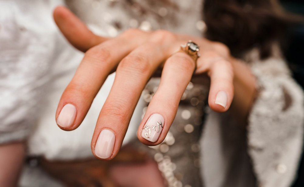 Bride showing initials in nail varnish