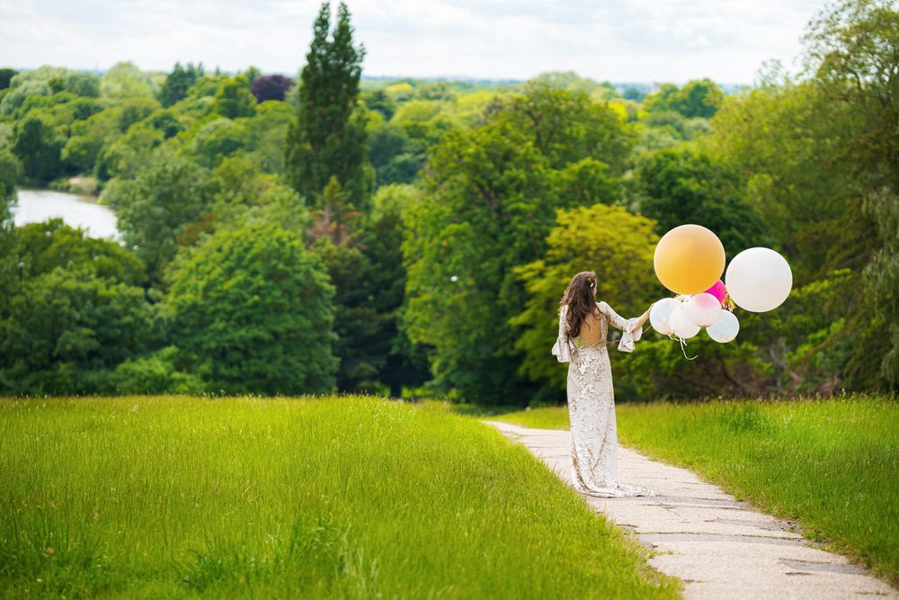 Bride with balloons on Richmond Hill