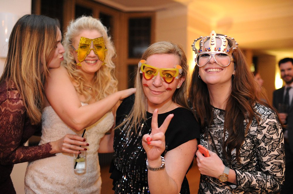 Bride and friends in comedy glasses Coombe Lodge