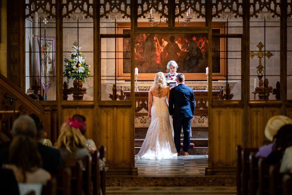 Bride and Groom at the altar of St Andrews Church, Blagdon