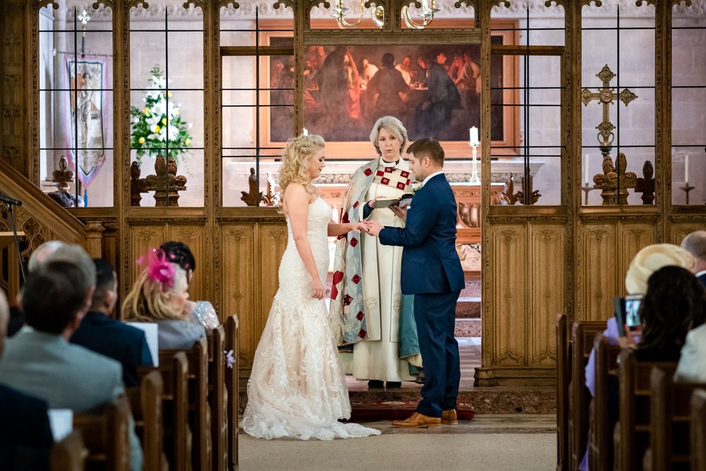 Exchanging of rings at St Andrews Church, Blagdon