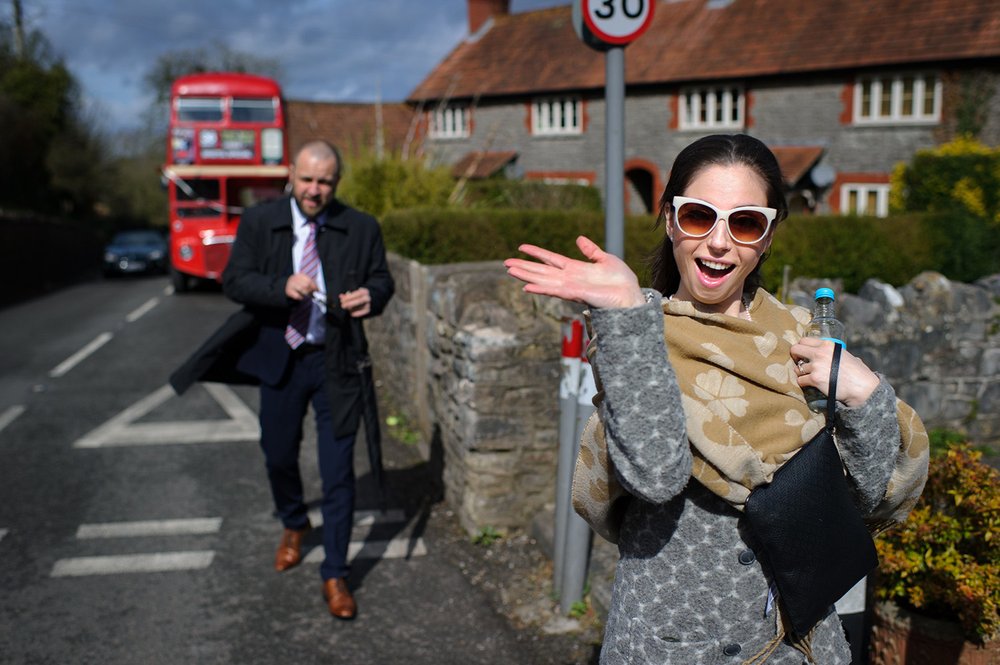 Guests wave after wedding bus breaks down