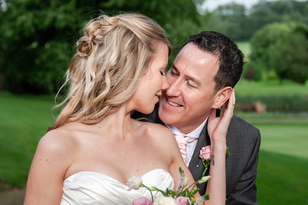 Bride and Groom look into each other eyes, Donnington Valley Hotel