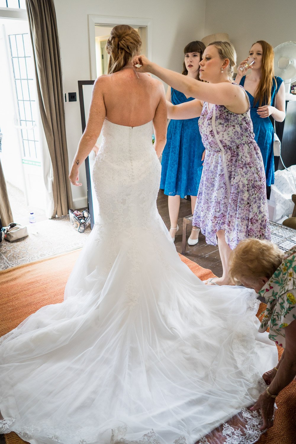 Bride in her dress at The Olde Bell Hotel, Hurley