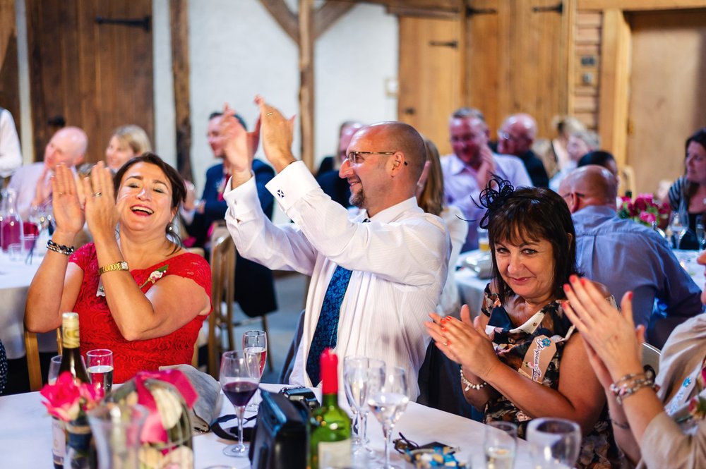 guests applaud a funny speech at Berkshire wedding